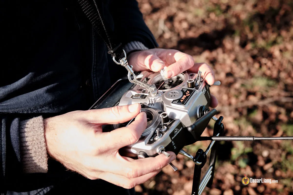 FPV controller with a person holding it in pinch hold