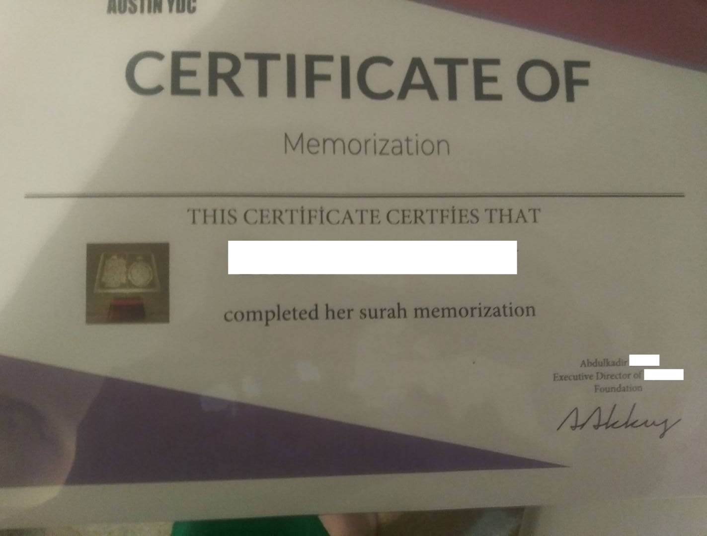 Certification of Memorization. Right under my censored name it says "her" surah memorization. They misspelled "certifies." 