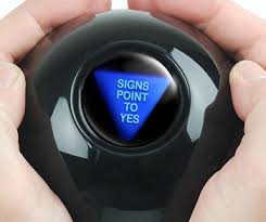 A photo of a Magic 8 ball showing the answer “All signs point to yes.”